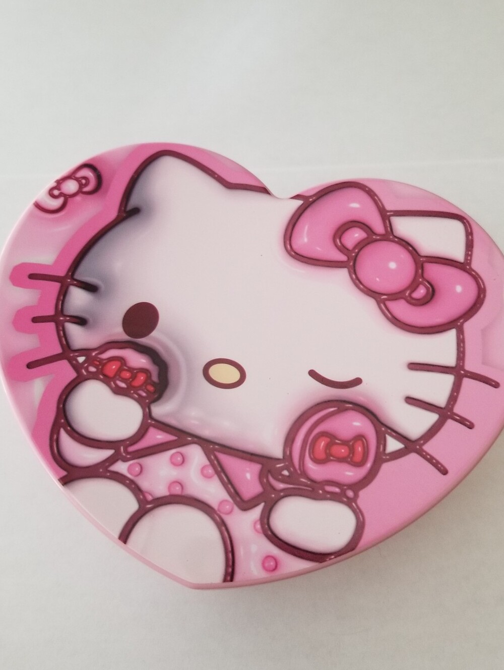 āHello Kitty Pink Heart-Shaped Small Jewelry Box with Inside Mirrorā